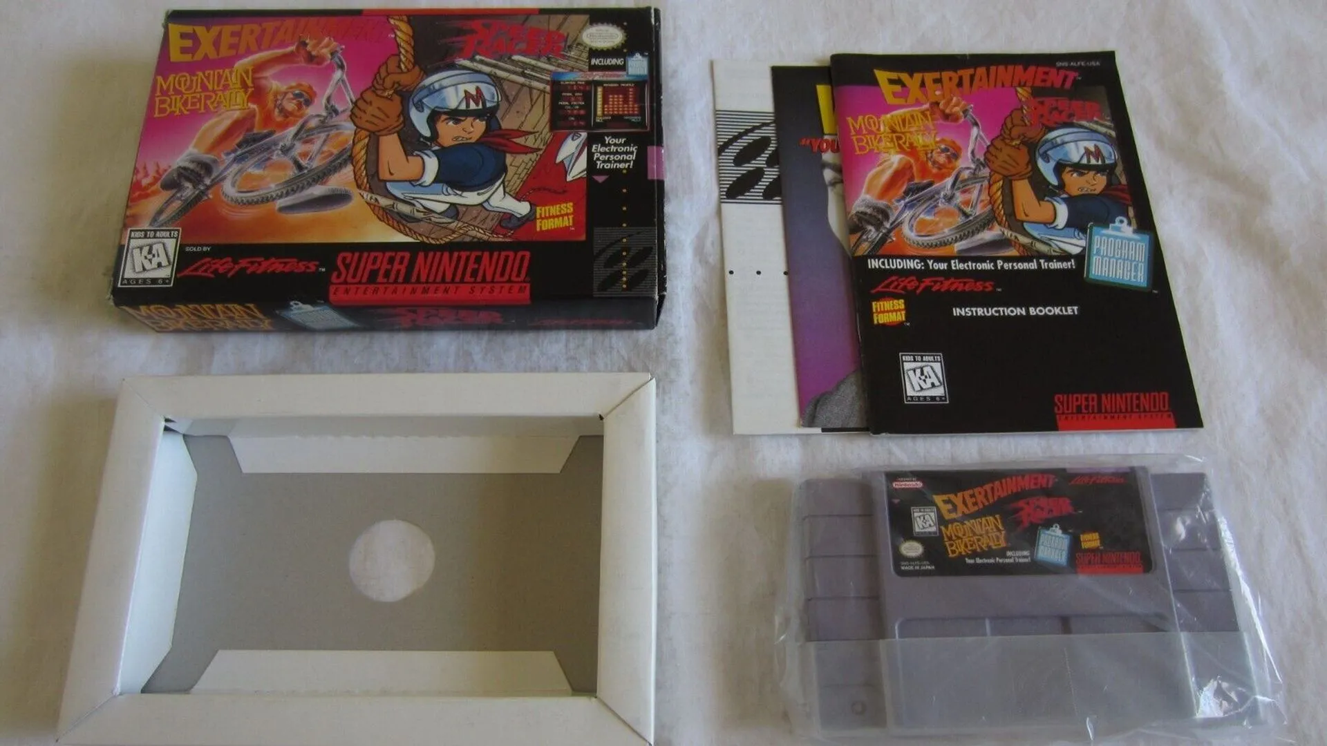 Bao bì (vỏ hộp) băng game Exertainment Mountain Bike Rally/Speed Racer cho hệ máy SNES, một gói game hiếm đi kèm máy tập thể dục.