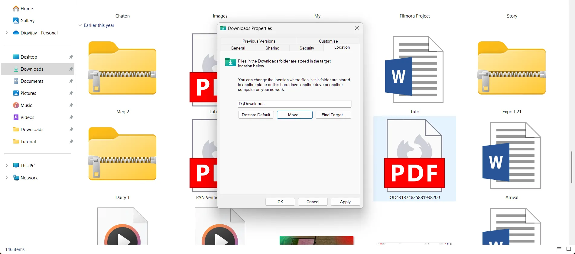 Cửa sổ thuộc tính thư mục Downloads trong Windows 11, hiển thị tab Location để thay đổi vị trí lưu trữ file tải về.