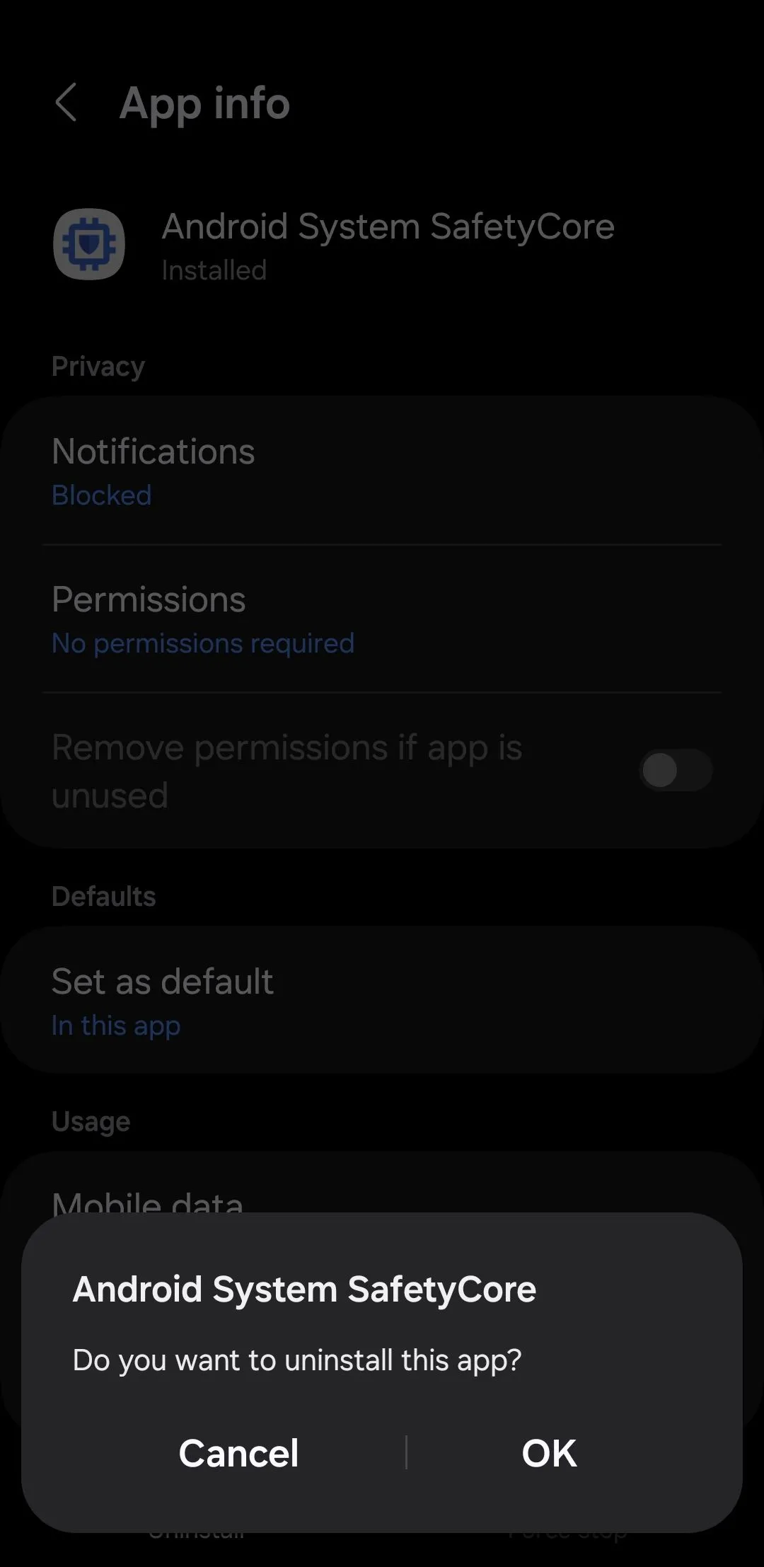 Màn hình chi tiết ứng dụng &quot;Android System SafetyCore&quot; trên điện thoại Android, hiển thị tùy chọn &quot;Gỡ cài đặt&quot; và &quot;Buộc dừng&quot;