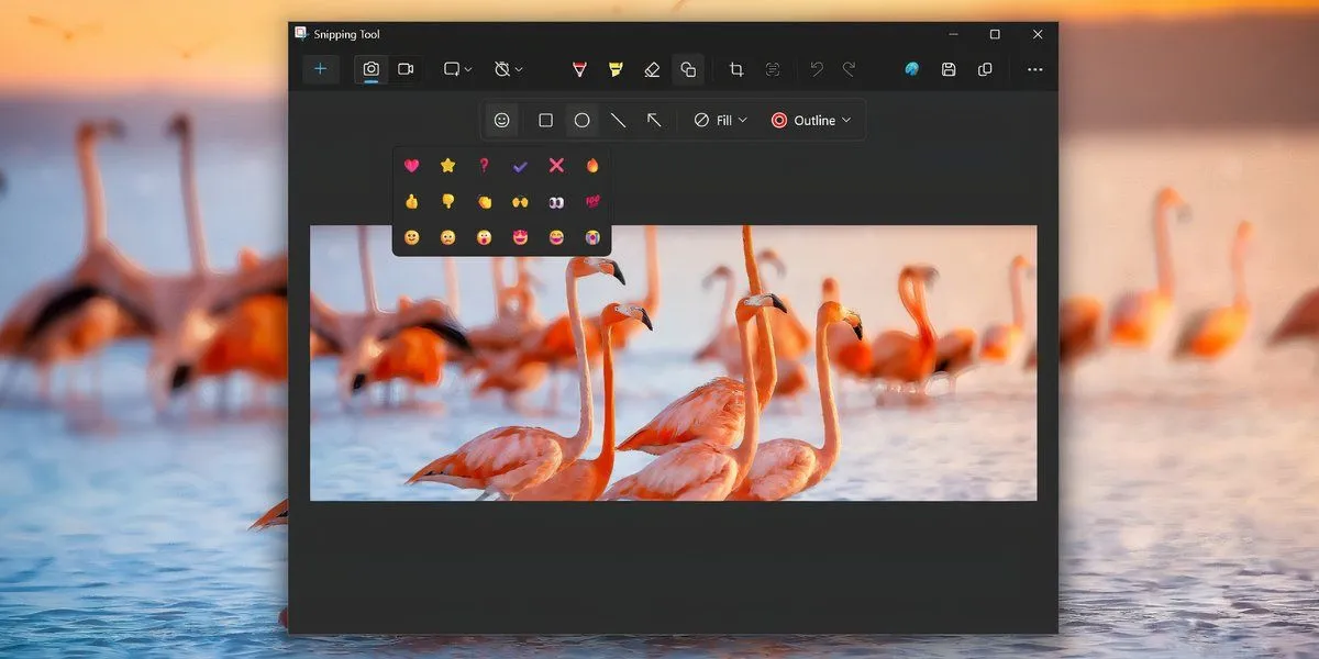 Menu chọn biểu tượng cảm xúc (emoji) trong mục &quot;Shapes&quot; của Snipping Tool, cho phép người dùng chú thích ảnh chụp màn hình.