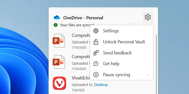 Mở cài đặt OneDrive từ thanh tác vụ để cấu hình đồng bộ hóa dữ liệu