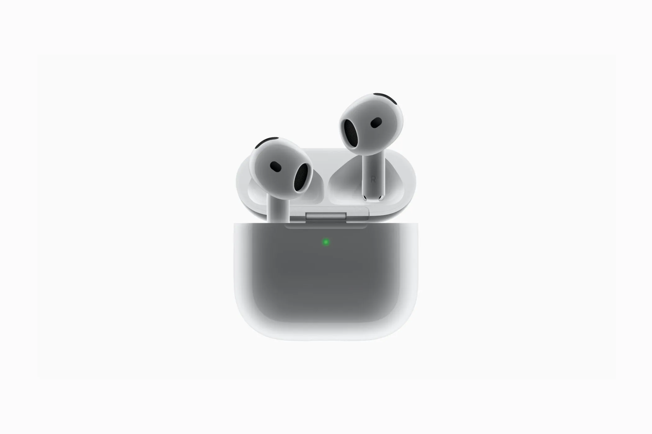 Tai nghe Apple AirPods 4 và hộp sạc đi kèm, cho thấy thiết kế nhỏ gọn hơn và không có nút pairing