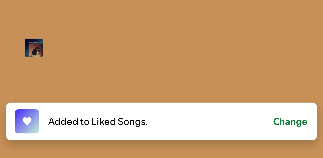 Tùy chọn thêm bài hát vào danh sách Bài hát đã thích trong game Spotify.